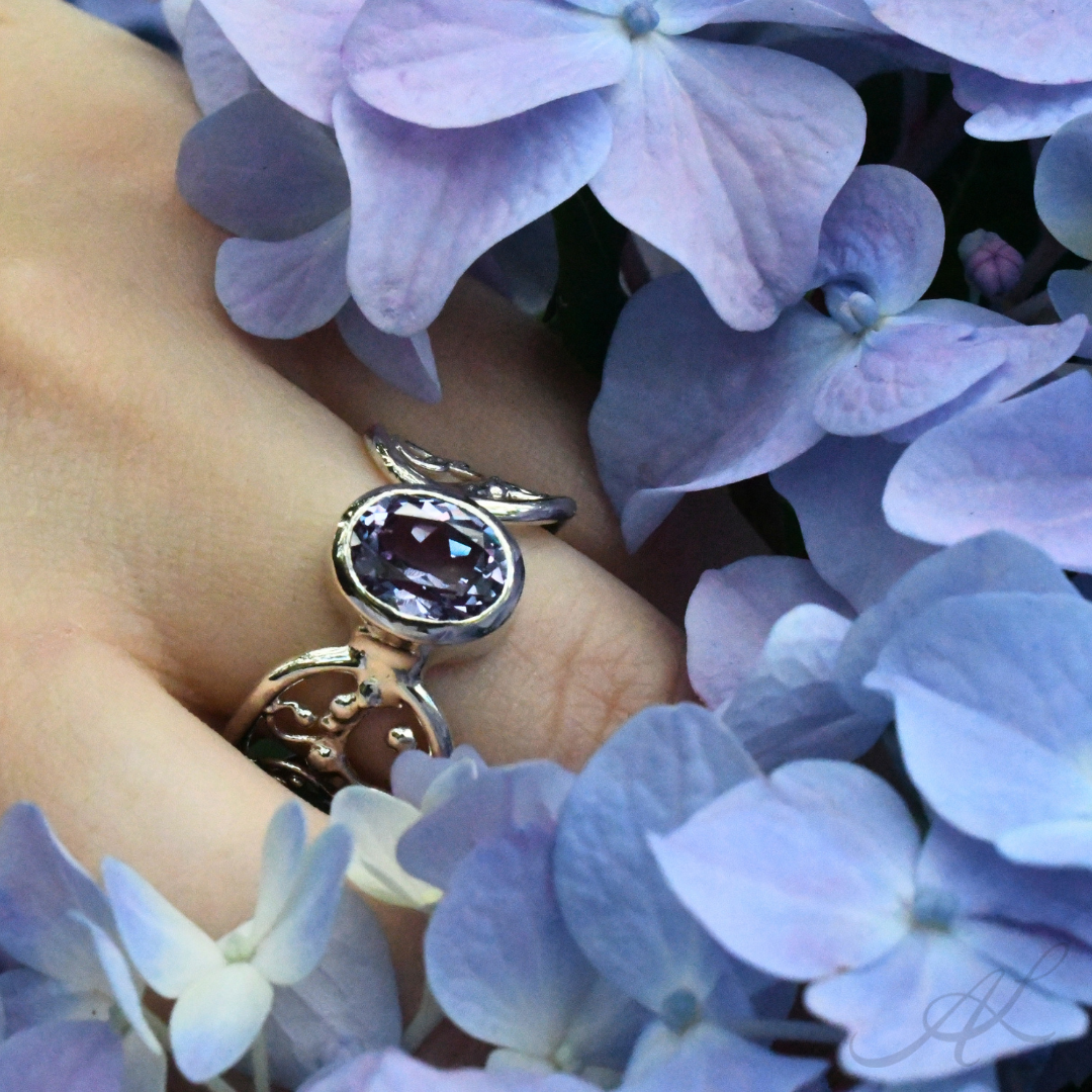 Infinite Radiance Ring, alexandrite bezel outdoor flowers